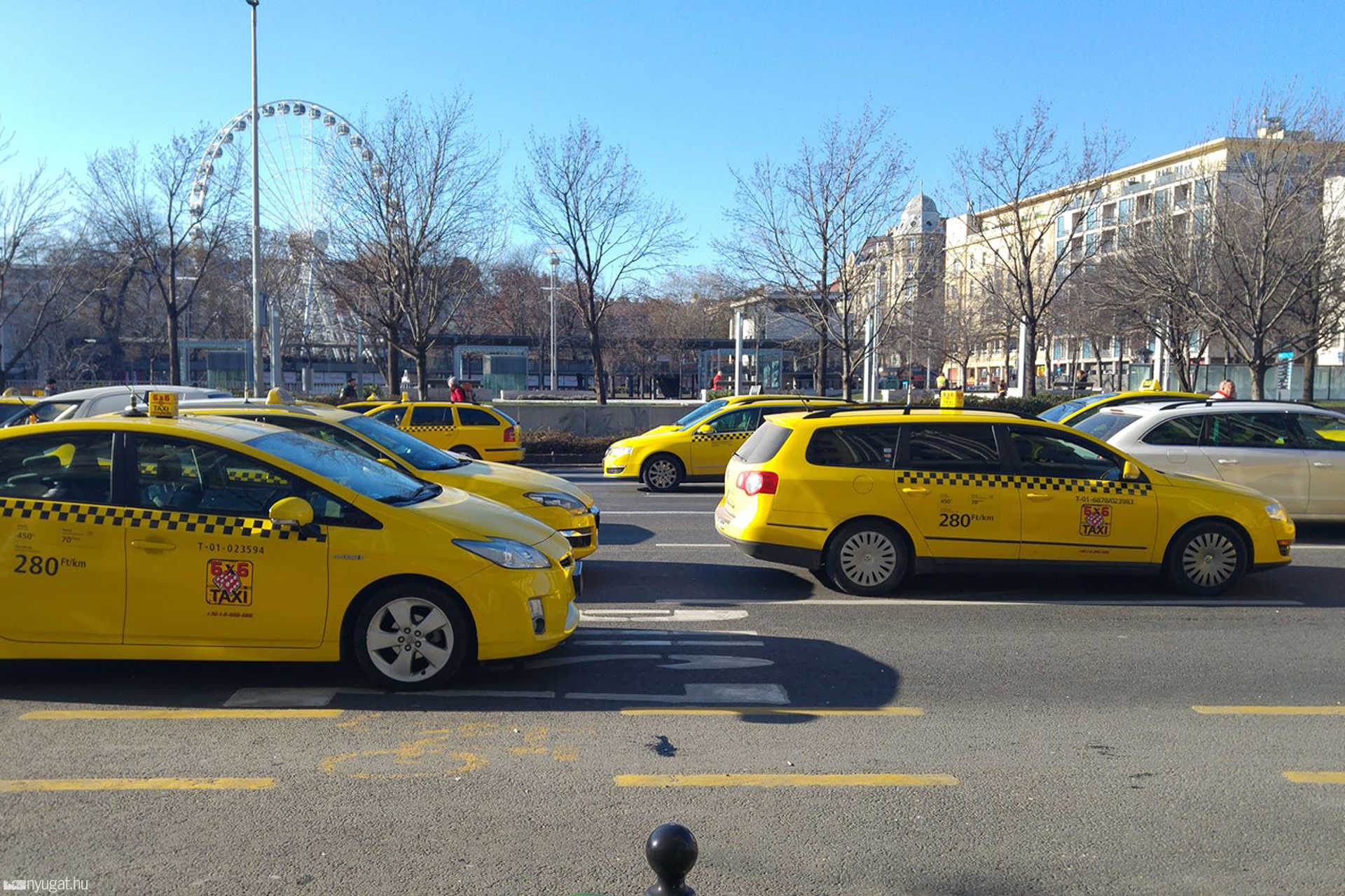 Elől taxik, hátul óriáskerék